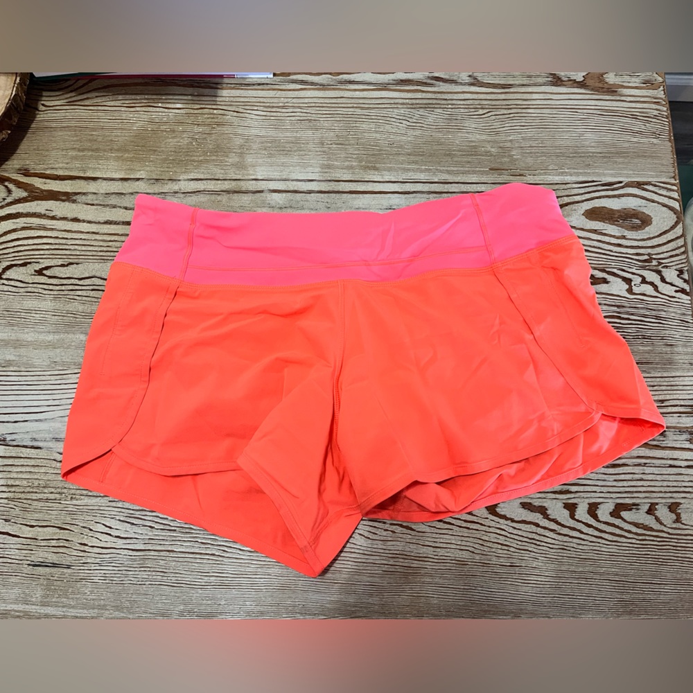 Neon orange Lulu lemon shorts
